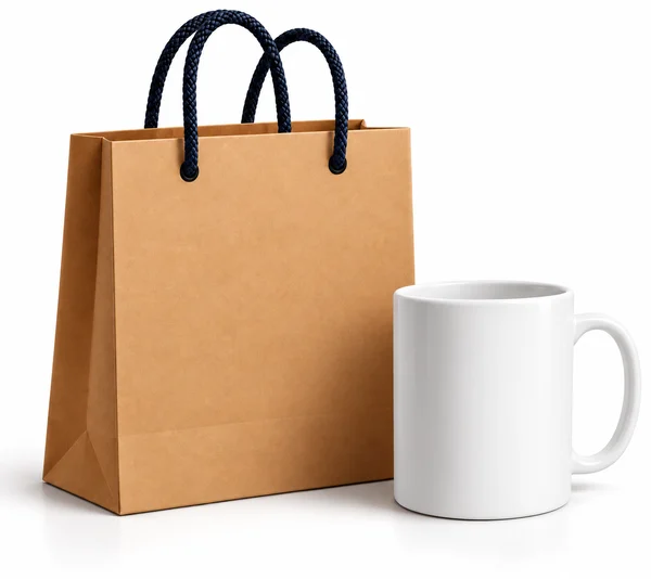 Paper shopping bag and white mug as promotional items